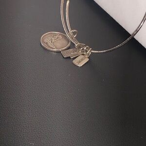 Alex and Ani charm bracelet, not marked along with black and silver bangles